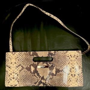 Micheal Kors skinny clutch